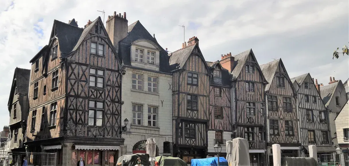 Half-timbered houses on Place Plumereau in Tours, the best base for Loire Valley wine and castle tours